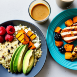 Post-Workout Meal**

A spread of healthy post-workout foods: grilled chicken breast, sweet potato, quinoa, avocado, and a protein shake with berries. The setting is a bright, modern kitchen with natural light. Focus on the vibrant colors of the food. safe for work, appropriate content, fully clothed, professional photography, perfect anatomy, natural proportions, modest.

**